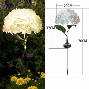 White hydrangea solar lantern measuring 70cm tall for balanced garden lighting.