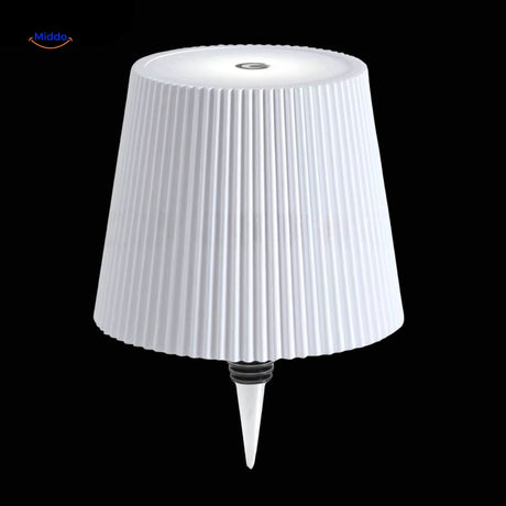White textured finish rechargeable bottle lamp with soft ambient lighting.