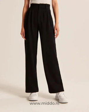 Wide-leg trousers in classic black with sleek design and versatile neutral tone.