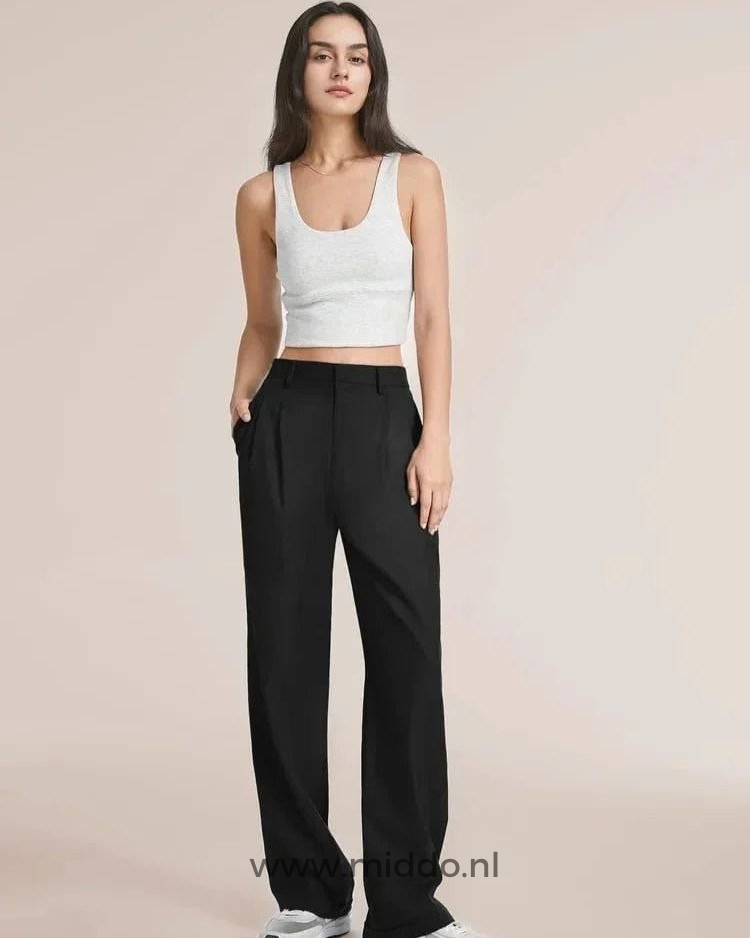 Black wide-leg trousers styled for modern minimalist fashion and all-day wear.