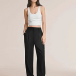 Black wide-leg trousers styled for modern minimalist fashion and all-day wear.