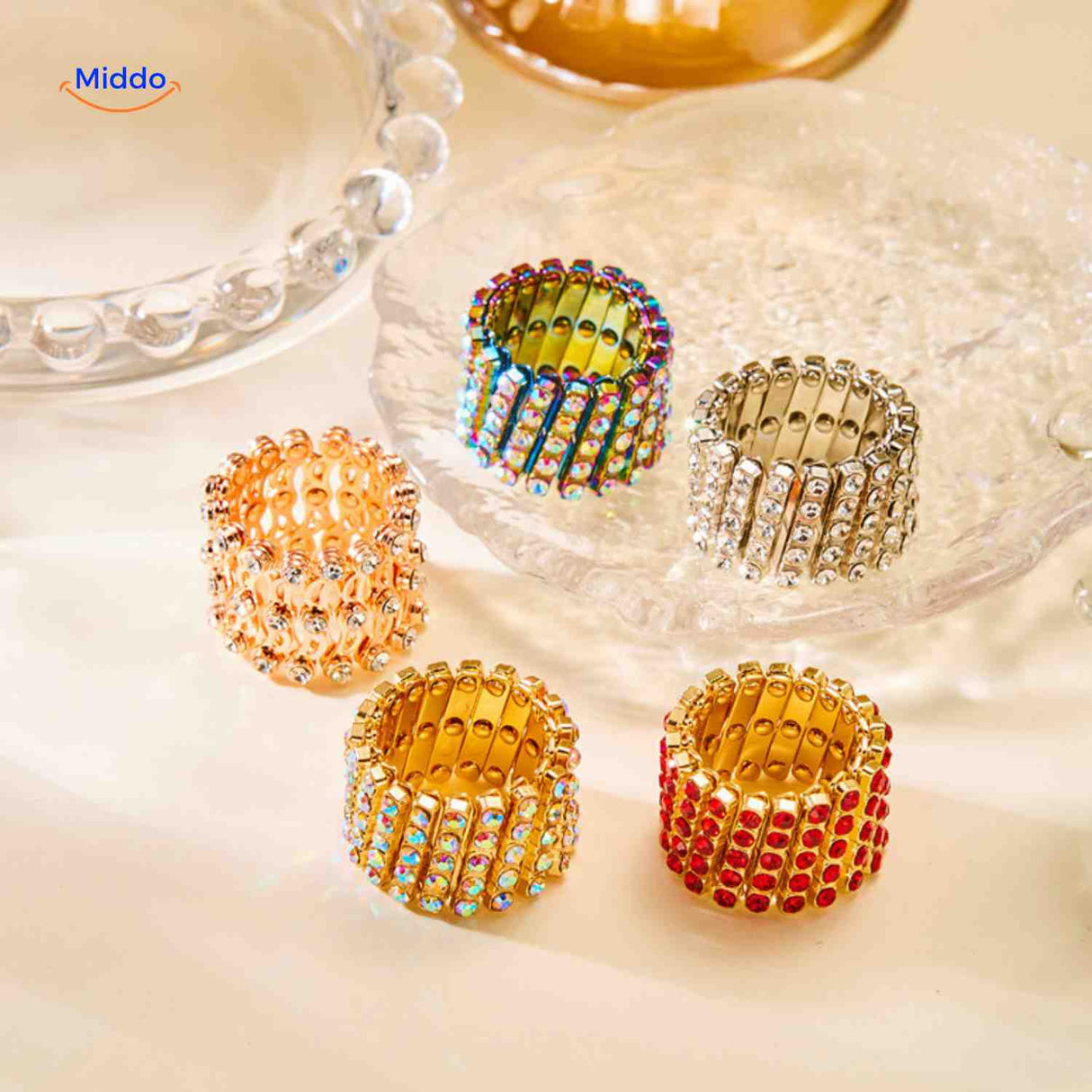 Wide adjustable rings with crystal rhinestones in multiple color options.