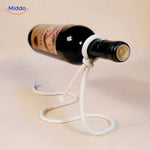 Suspended wine holder with natural rope design.