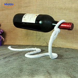 White rope wine bottle holder with elegant suspension.