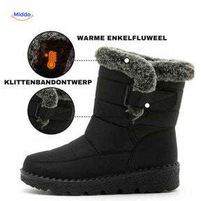 Winter boots with velcro design for secure, waterproof fit.