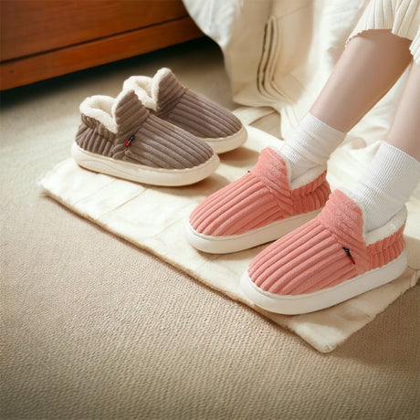 Brown and pink therapeutic fleece slippers, warm and cushioned for winter comfort.