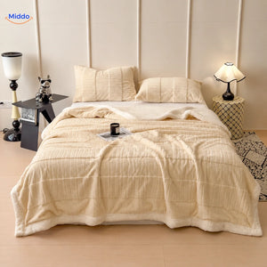 Winterra throw blanket with wave texture in ecru and soft fleece reverse