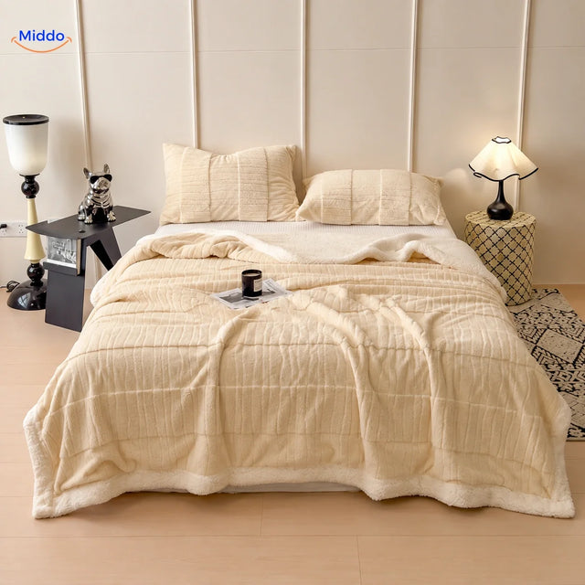 Winterra throw blanket with wave texture in ecru and soft fleece reverse