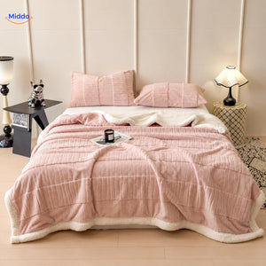 Winterra throw blanket with wave texture in light pink and soft fleece reverse