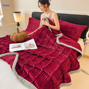 Winterra throw blanket with ribbed texture in burgundy and soft fleece reverse