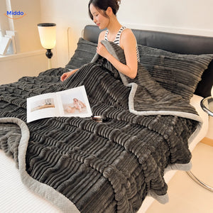 Winterra throw blanket with ribbed texture in dark gray and soft fleece reverse