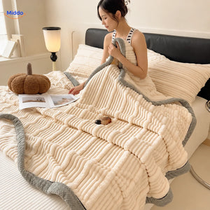 Winterra throw blanket with ribbed texture in ecru and soft fleece reverse