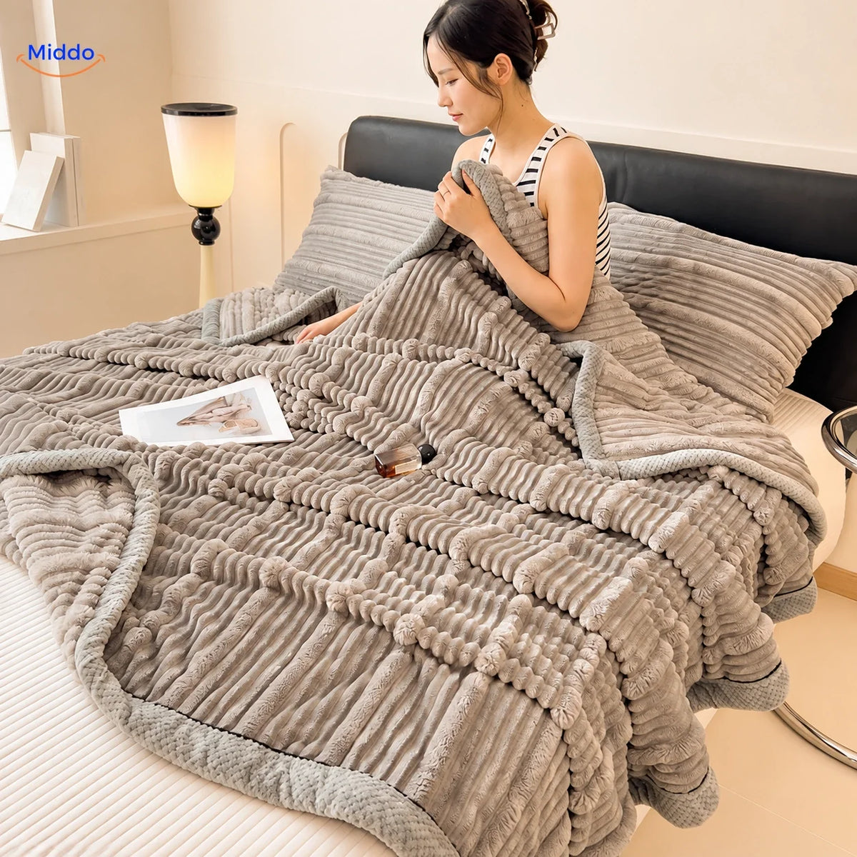 Winterra throw blanket with ribbed texture in light gray and soft fleece reverse