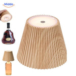 Wireless touch-control LED lamp designed for wine bottles and home bar.