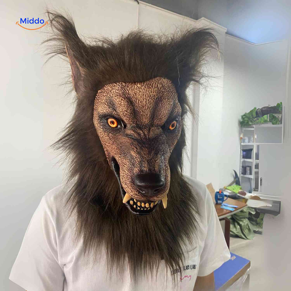 Wolf mask close-up showing glowing golden eyes and textured latex craftsmanship.