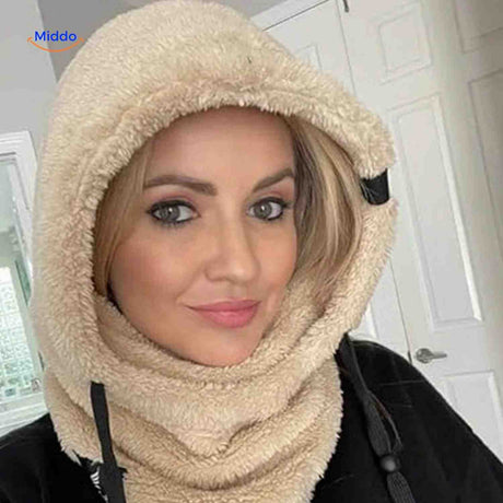 Feminine thermo hat in beige featuring fleece construction for warmth and protection.