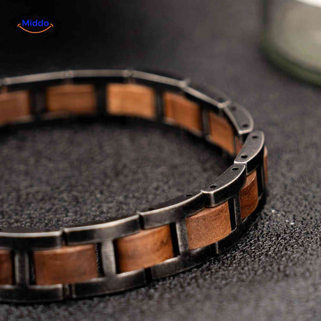 Flat lay detailed view of wooden bracelet showing texture and wood craftsmanship.