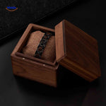 Woodforge bracelet resting in premium wooden box for presentation and storage.