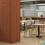 Self-adhesive 3D slat panels installed on a ceiling showing a clean linear slat pattern.