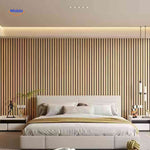 Warm wood slat 3D wall panels installed across a restaurant feature wall.