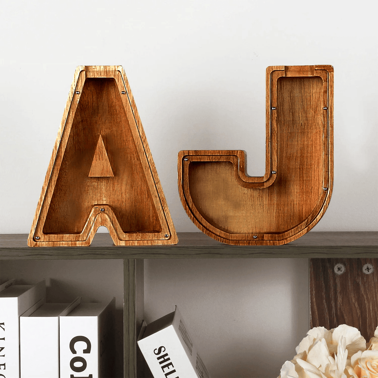 Complete set of wooden alphabet piggy banks featuring individual letter designs for kids.