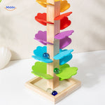 Natural wood ball run tree with polished wooden frame and base.