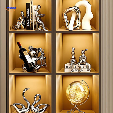 Handcrafted wooden bear wine bottle holder gripping a wine bottle upright as an elegant display piece.