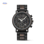 Wooden chronograph watch with textured dial surface detail.