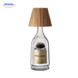 Table lamp with natural wooden shade for drink bottles and wine.