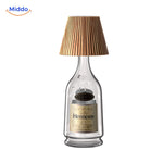 Table lamp with natural wooden shade for drink bottles and wine.