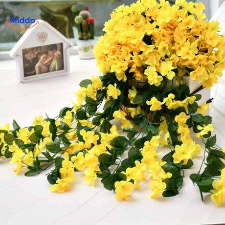 Yellow artificial orchids with lush cascading blooms.