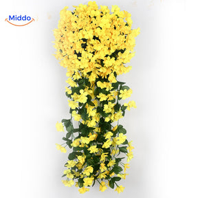 Yellow artificial orchid flowers with full cascading arrangement.