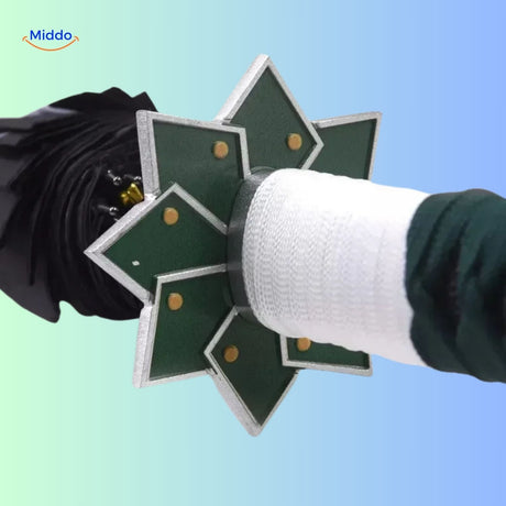 Detail shot of ZenBrella umbrella handle with green star-shaped design