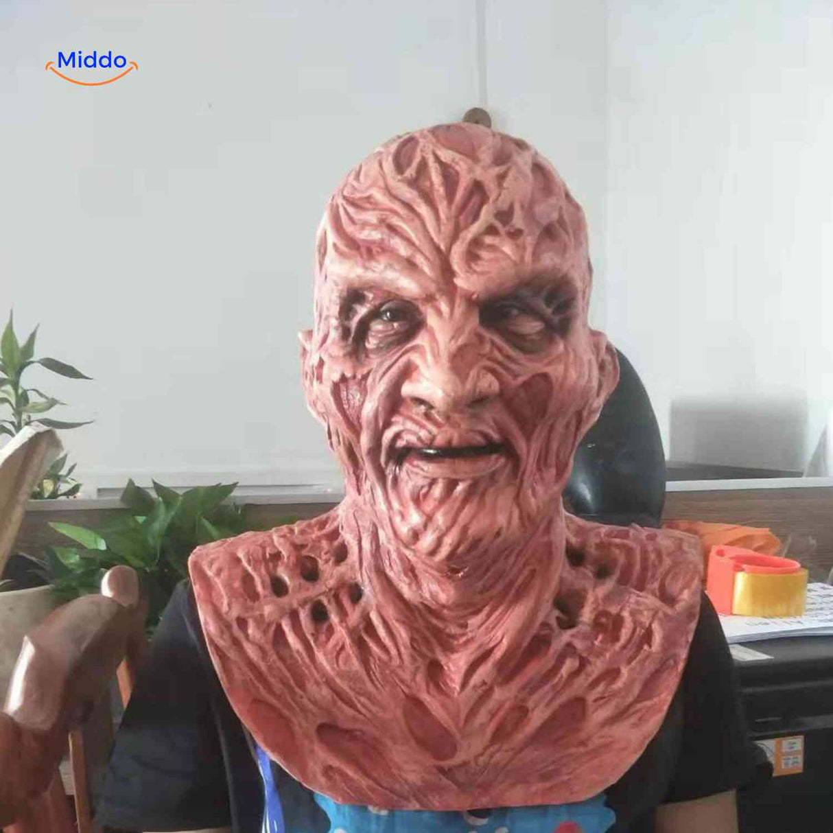 Realistic closeup of person wearing Zombiora zombie mask as a portrait.